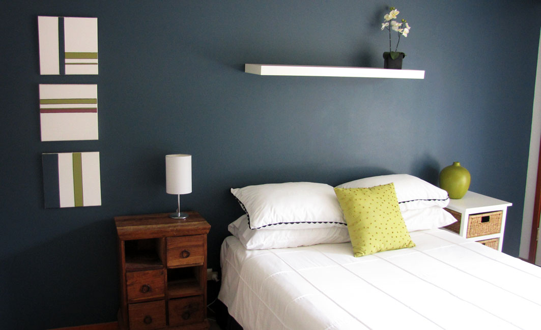 Bedroom with Blue feature wall